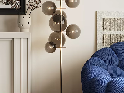Elegant Golden Floor Lamp With Multiple Gray Glass Globes Beside Blue Sofa And Wall Decor 3d model