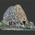 Traditional Stone Dome Building with Circular Structure and Wooden Entrance Surrounded by Green Grass