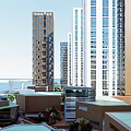 Modern Urban High Rise Buildings With Low Rise Structures And Coastal Greenery