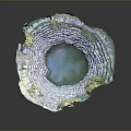 Stunning Circular Sinkhole Landscape With Layered Rocks Blue Water And Green Vegetation