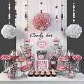 Candy Bar With Striped Backdrop Hanging Pom Poms And Colorful Lollipop Jars