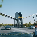 Modern Entrance Gate With LOGO Featuring Vehicles Passing Through Outdoor Area Surrounded By Trees