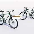 Two Green Classic Bicycles With Vintage Design Brown Seats And Black Tires