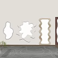 Decorative Wall Mounted Mirrors Of Various Shapes In Interior With Rug And Plant