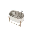 Light Colored Padded Baby Crib With Wooden Frame And Plush Rabbit Toys
