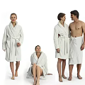 Group of People in Different Poses Wearing White Bathrobes and Towels
