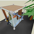Transparent Glass Structure With Wheels Nearby Tree And Person Walking Inside