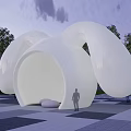 Modern White Sculptural Outdoor Structure With Trees Pedestrians And Checkered Ground