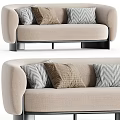 Modern Beige Sectional Sofa with Gray and Brown Patterned Pillows and Black Metal Legs