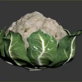 Natural Organic Fresh Cauliflower With Green Leaves On Dark Surface