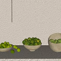 Ceramic Bowls With Green Fruits Arranged On Light Colored Background Countertop