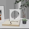 Elegant Reed Diffuser Aromatherapy Product On Book For Modern Home Decor With Green Plant