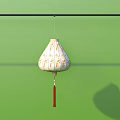 White Lantern With Golden Patterns And Red Tassel Hanging On Green Background