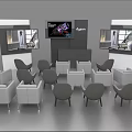 Display Shelves in Exhibition Hall with White Grey Sofas Chairs Digital Screen and Dyson Logo