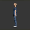 Woman in Blue Scrubs Standing Against Gray Background with Arms Naturally Outstretched