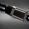 Silver Metallic Motorcycle With Unique Retro Futuristic Design And Large Chrome Wheels