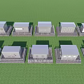 Small House Models Arranged In Rows With Various Roof Designs On Green Grass