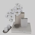 Elegant Decorative Ornament Set With White Orchids Striped Vases Candle Holders And Bowl On Books
