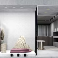Modern Window Display Merchandising With Art Sculptures Display Tables Green Plants And Lighting Design