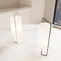 Two Table Lamps With White Shades And Metal Frames On White Marble Tabletop By Window 3d model