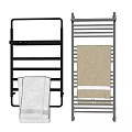 Modern Bathroom Accessories Including Metal Towel Racks And Soft Colored Towels