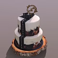 Two Tiered Cake With Black White Drizzle Decorations And Top Ornament On Rustic Wooden Base