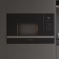 Modern Kitchen With Built In Microwave Appliance And Gray Cabinets