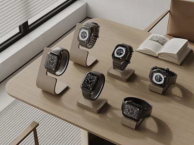 Multiple Smart Watches Displayed On Wooden Table With Open Book 3d model