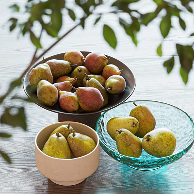 Ceramic Bowls Filled With Fresh Pears On Wooden Surface With Green Leaves 3d model