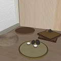 Woven Round And Square Floor Cushions With Tea Cups On Wooden Floor Near Window