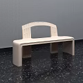 Modern Light Colored Bench With Curved Backrest On Dark Floor And Gray Wall 3d model