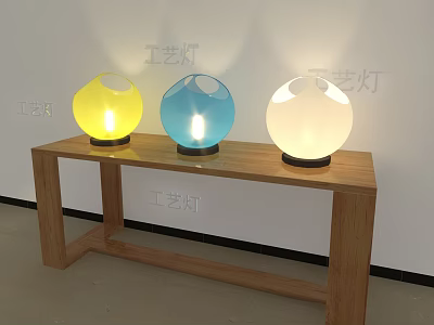 Three Colorful Spherical Table Lamps Yellow Blue White Lit on Wooden Table 3d model