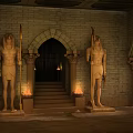 Ancient Temple Entrance With Stone Statues Holding Spears Arched Doorway And Lit Torches