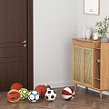 Wooden Shoe Cabinet with Vase and Decorative Items and Colorful Sports Balls in Indoor Space