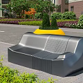 Gray Modern Outdoor Chair With Striped Details Surrounded by Green Plants and Flower Beds