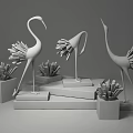 Gold And Silver Crane Decorative Ornament Set On White Bases And Orange Display Stands