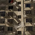 Multi Storey Residential Building Featuring Light Colored Exterior Balconies Air Conditioning Units And Windows