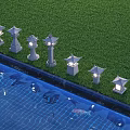 Outdoor Lights Japanese Lantern Style Lit Along Lawn Edge By Pool With Koi Fish Grass