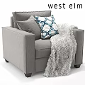 Cozy Gray Accent Chair With Decorative Pillows And Fuzzy Blanket In Living Room