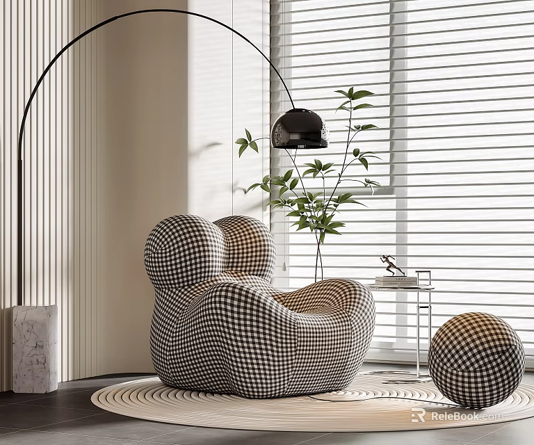 Black And White Checkered Bean Bag Chair With Ottoman Green Plant And Floor Lamp 3d model 
