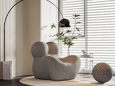 Black And White Checkered Bean Bag Chair With Ottoman Green Plant And Floor Lamp 3d model