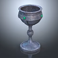 Vintage Metallic Decorative Cup With Green Gemstone Accents And Carved Base