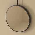 Modern Round Mirror With Black Frame Hanging On Beige Wall
