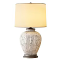 White Ribbed Table Lamp With Floral Pattern And Cream Lampshade for Home Decor