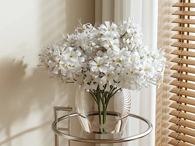 White Flowers In Transparent Vase On Round Glass Table With Wooden Blinds And Natural Light 3d model