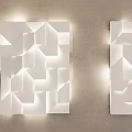 Modern Geometric White Wall Lamps Mounted On Beige Wall With Soft Lighting Design