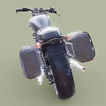 Vintage Black Motorcycle With Spoke Wheels Headlight Exposed Engine And Leather Saddlebag