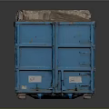 Blue Dumpster Filled With Stacked Recycled Paper And Cardboard Materials