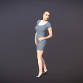 Woman In Fitted Blue Dress Standing With Black High Heels On Dark Gray Background