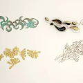 Artistic Wall Decor Featuring Curved Metal Designs Gold Fan And Floral Patterns